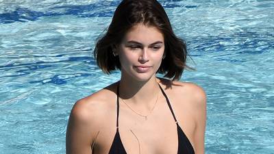 Kaia Gerber Rocks A Black String Bikini As She Plays Chess With Her Adorable Dog — See Pic - hollywoodlife.com