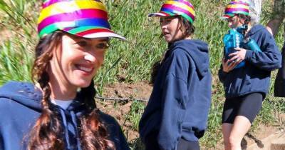 Dakota Johnson dons rainbow cap as she films scene for Am I OK? in LA - www.msn.com