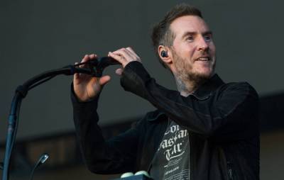 Massive Attack’s Robert Del Naja to speak to MPs about environmental impact of festivals - www.nme.com - Britain
