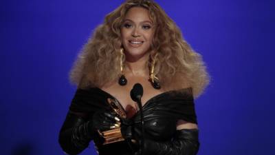 Beyoncé Gives Emotional Shout-Out to Her 'Rock' JAY-Z and Their Three Children in Historic GRAMMYs Win - www.etonline.com
