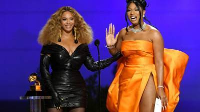 Megan Thee Stallion and Beyoncé Share Touching Moment as They Accept Best Rap Song GRAMMY - www.etonline.com - Houston