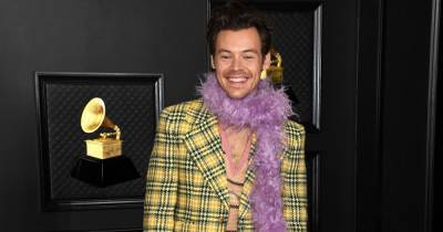 Harry Styles sends fans wild over outfit as he picks up first Grammy award - www.manchestereveningnews.co.uk