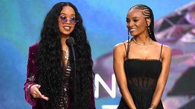 Grammys: H.E.R. Wins Song of the Year, Declares on Stage: "We Are the Change We Wish to See" - www.hollywoodreporter.com