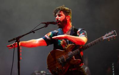 Foals reschedule majority of their UK tour dates to 2022 - www.nme.com - Britain