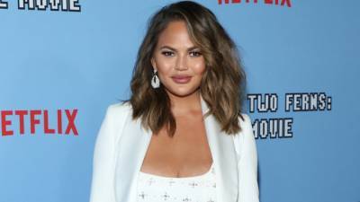 Chrissy Teigen Shares Hilarious Pic of Son Miles Blocking Her Topless Thirst Trap - www.etonline.com