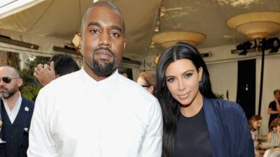 How Kim Kardashian Is Handling Kanye West Not Speaking Directly to Her Amid Divorce - www.etonline.com - Chicago