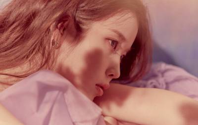 Watch IU kick ass in the teaser clip for ‘LILAC’ - www.nme.com