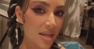 Kim Kardashian films Kourtney getting strapped into sex toy during raucous girls night in with friends - www.ok.co.uk