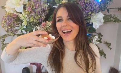 Elizabeth Hurley poses in skintight mini dress as she treats herself to an Easter feast - hellomagazine.com