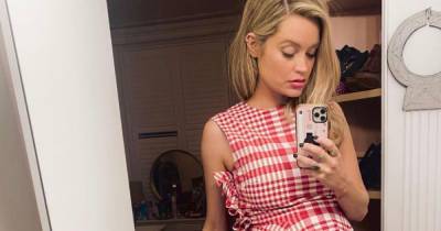 Pregnant Laura Whitmore shares snap of bare baby bump alongside her adorable dog Mick - www.ok.co.uk