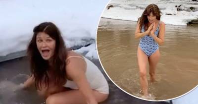 Helena Christensen flaunts her figure as goes for a dip in a river - www.msn.com