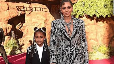 Blue Ivy Carter wearing a crown and sipping out of her first Grammy is big energy - edition.cnn.com