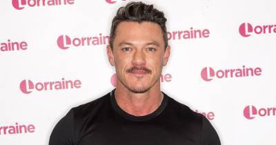 Luke Evans Shows Off Chiseled Abs After 8 Months of Gym ‘Work’: See the Before and After - www.usmagazine.com