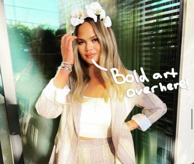 Chrissy Teigen Shows Off New Finger Tattoos -- Check Out The Ink! - perezhilton.com