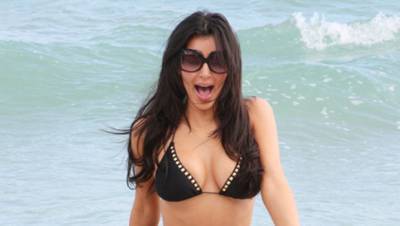 Kim Kardashian Rocks 4 Tiny Bikinis In New Video After Kris Breaks Silence On Her Divorce - hollywoodlife.com - USA