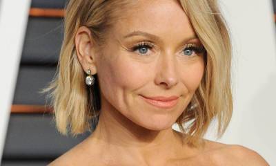 Kelly Ripa relaxes on the beach in celebratory photo to mark special occasion - hellomagazine.com