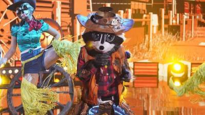 'The Masked Singer': The Raccoon Gets Chased Off the Competition in Week 3 -- See Who Was Under the Mask! - www.etonline.com - Russia