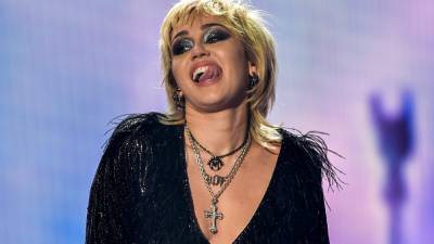 Miley Cyrus says she's recovering from 'rager' as photos surface of her letting loose at a bar - www.foxnews.com - Montana