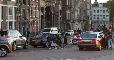 Snared on the streets by armed police in Amsterdam - the fleeing killer who thought he'd got away with it - www.manchestereveningnews.co.uk - city Amsterdam