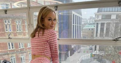 Amanda Holden leaves fans flustered as she confidently flaunts pert bottom in tight pink trousers - www.ok.co.uk - Britain