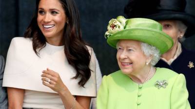 Queen Elizabeth and Royal Family React to Allegations That Meghan Markle's Aides Were Bullied - www.etonline.com