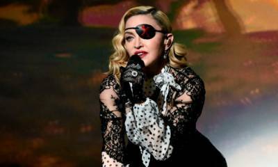 Madonna shares racy lingerie photos after Photoshop controversy - us.hola.com