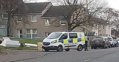 Glasgow street locked down by police as injured man rushed to hospital - www.dailyrecord.co.uk - Scotland
