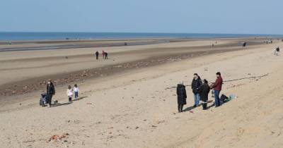 Crowds flock in the sunshine to Formby Beach but find 'there's no beach' - www.manchestereveningnews.co.uk - Manchester