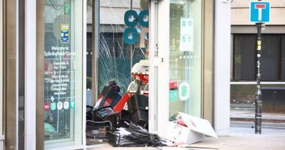 Axemen smash into Co-op before using Range Rover to rip cash machine off its wall in Manchester city centre - www.manchestereveningnews.co.uk - Manchester