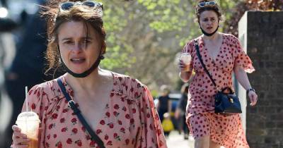 Helena Bonham Carter dons a raspberry pink dress for stroll with a pal - www.msn.com - Britain