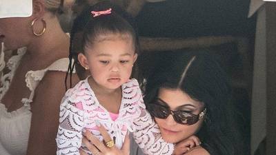 Kylie Jenner Daughter Stormi Show Off Matching Balmain Outfits Passport Cases — Watch - hollywoodlife.com