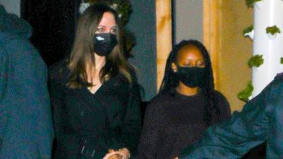 Angelina Jolie Daughter Zahara, 16, Hold Hands While Leaving Girls’ Dinner — Pics - hollywoodlife.com