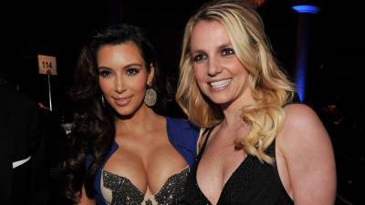 Kim Kardashian Defends Britney Spears and Recalls Own 'Traumatizing' Experience With Tabloids - www.etonline.com