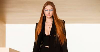 Gigi Hadid Returns to the Runway With Fiery Red Hair Inspired by Beth Harmon From ‘Queen’s Gambit’: Watch - www.usmagazine.com