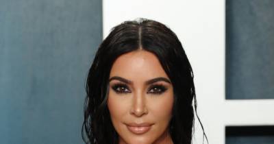 Kim Kardashian says media almost 'broke' her during first pregnancy - www.wonderwall.com