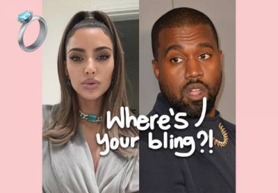 Kim Kardashian Apparently DONE Wearing Wedding Ring -- But Kanye Is Still Wearing His! - perezhilton.com