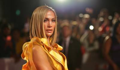 Jennifer Lopez, 51, shows off incredible physique in slinky cutout minidress - hellomagazine.com