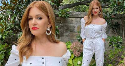 Isla Fisher oozes elegance in a white jumpsuit and bold red lip - www.msn.com - Australia
