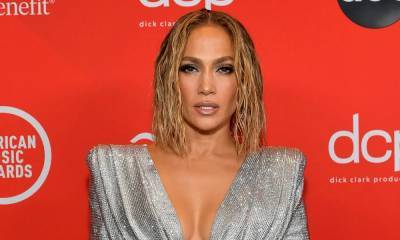 Jennifer Lopez bares abs as she wows in white PVC cropped top and pants - hellomagazine.com
