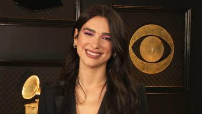 Dua Lipa Talks 'Mind-Blowing' GRAMMY Nominations and Her 'Sparkly' Red Carpet Plans (Exclusive) - www.etonline.com