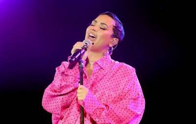 Watch Demi Lovato perform new single ‘Dancing With The Devil’ on ‘Fallon’ - www.nme.com
