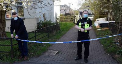 Woman rushed to hospital as police lock down street in Edinburgh - www.dailyrecord.co.uk