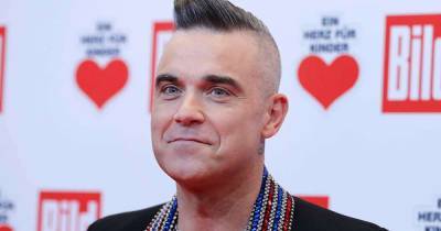 Robbie Williams reveals major hair change – and he did it himself - www.msn.com