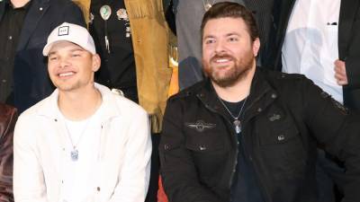 Chris Young surprises Kane Brown on stage to perform their duet 'Famous Friends' - www.foxnews.com - Tennessee