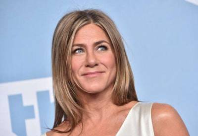 Jennifer Aniston denies reports she is adopting a child after previously condemning media scrutiny in essay - www.msn.com