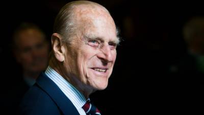 The Royal Family Released Never-Before-Seen Pics of Prince Philip With His Great-Grandkids - www.glamour.com