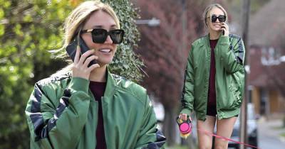 Megan McKenna opts for casual look in bomber jacket and black shorts - www.msn.com