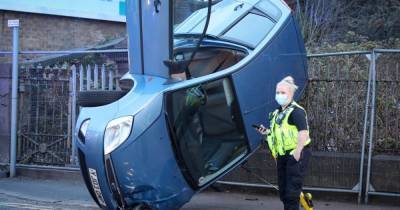 'Machete' pictured inside wrecked car after it flipped on its side in crash - www.manchestereveningnews.co.uk