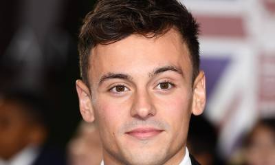 Tom Daley reveals one of son Robbie's baking habits in cute video - hellomagazine.com