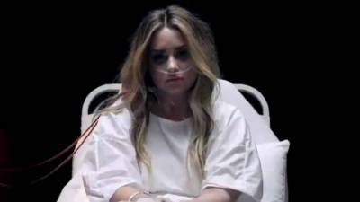 Demi Lovato Screams From Her Hospital Bed in 'Dancing With the Devil' Music Video - www.etonline.com